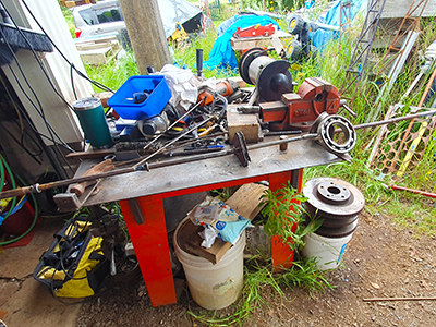 An image of welders and workshop front at McKinley Rd Creatives. Rather chaotic, but creatively so.